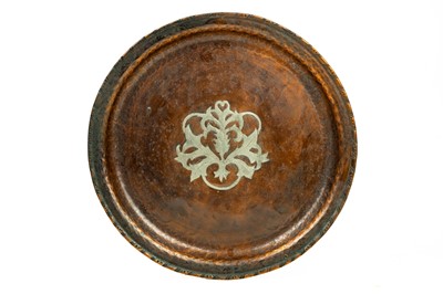 Lot 47 - An Arts and Crafts Hugh Wallis copper tray of circular form.