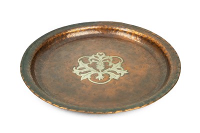 Lot 47 - An Arts and Crafts Hugh Wallis copper tray of circular form.