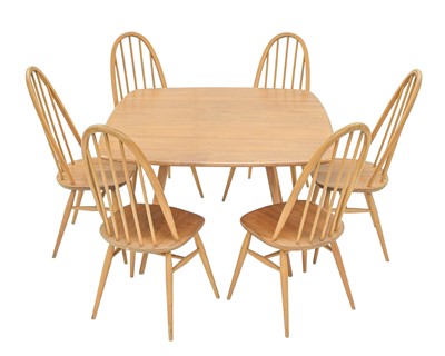 Lot 673 - Ercol dining table and six chairs.