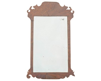 Lot 796 - A walnut framed fretwork wall mirror.