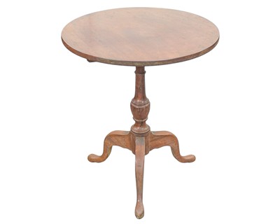Lot 893 - An Edwardian walnut tripod wine table.