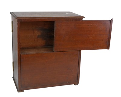 Lot 58 - A late George III mahogany apothecary cabinet.