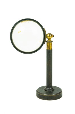 Lot 40 - A brass and lacquered adjustable bulls eye lens.