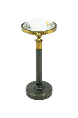 Lot 40 - A brass and lacquered adjustable bulls eye lens.