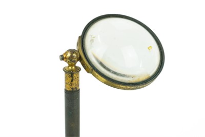 Lot 40 - A brass and lacquered adjustable bulls eye lens.