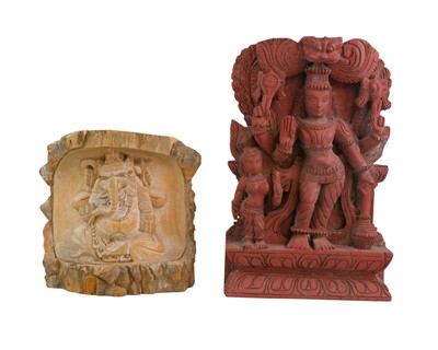 Lot 428 - Two carved wood Indian deities.
