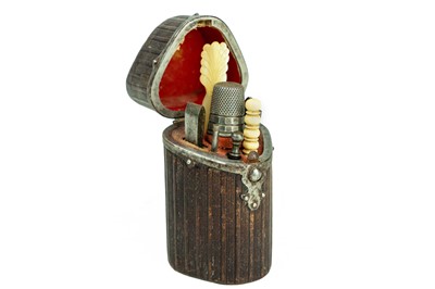 Lot 51 - A tooled leather and steel etui.