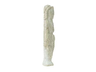 Lot 106 - A small carved stone figure of a deity.