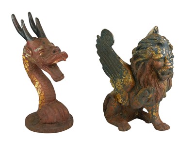 Lot 81 - A cast iron winged lion.
