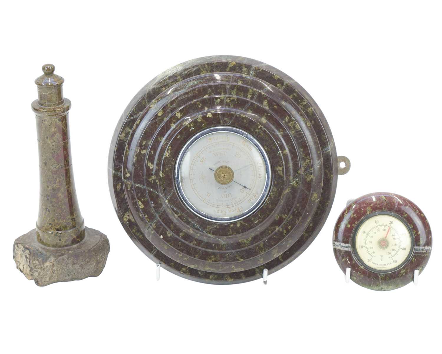 Lot 39 - A Cornish serpentine turned serpentine model of a lighthouse.