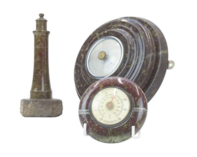 Lot 39 - A Cornish serpentine turned serpentine model of a lighthouse.
