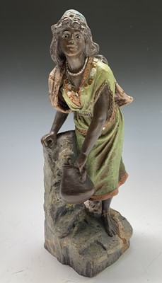 Lot 906 - A German cold painted terracotta figure of a...