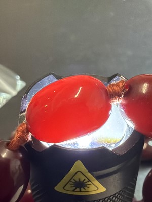 Lot 85 - A bakelite cherry amber style graduated oval bead necklace.