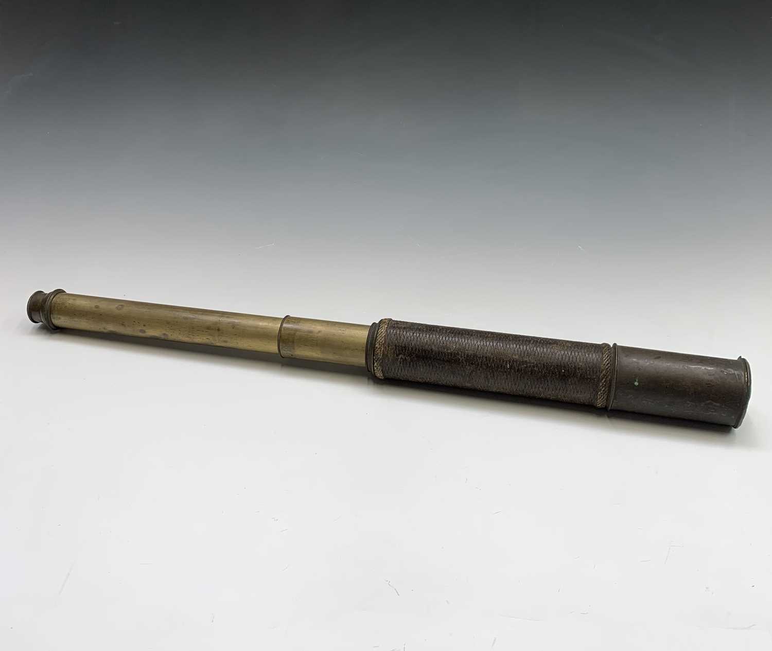 Lot 144 - A 19th century two draw brass Naval telescope,...