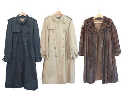 Lot 324 - Two Burberry trench coats.