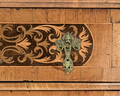 Lot A William and Mary seaweed marquetry inlaid chest.
