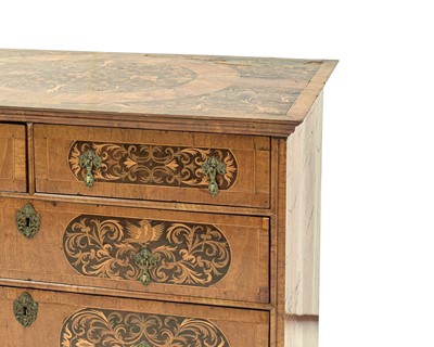 Lot A William and Mary seaweed marquetry inlaid chest.