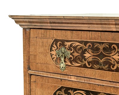 Lot A William and Mary seaweed marquetry inlaid chest.