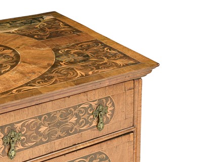 Lot A William and Mary seaweed marquetry inlaid chest.
