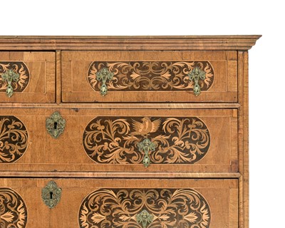 Lot A William and Mary seaweed marquetry inlaid chest.