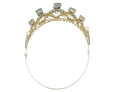 Lot 287 - An impressive silver-gilt tiara, set with diamonds, emeralds and cultured pearls.