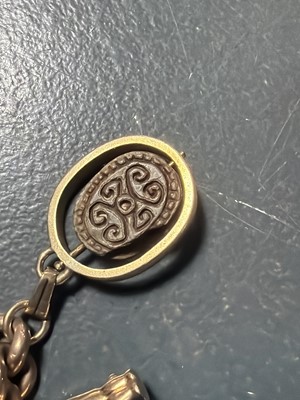 Lot 158 - A good 9k charm bracelet applied with 10 gold charms and a turquoise set padlock clasp.