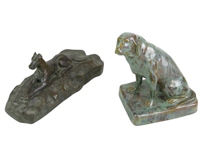 Lot 129 - A bronze sculpture of a Doberman.