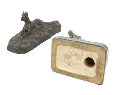 Lot 129 - A bronze sculpture of a Doberman.