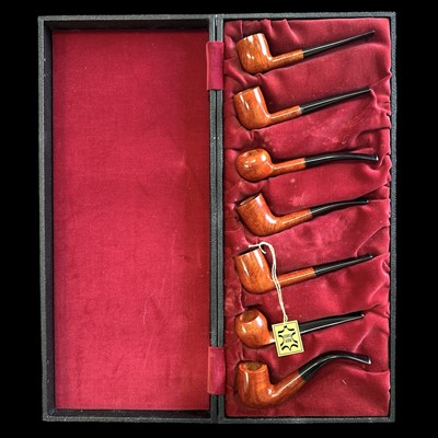 Lot 7 - A boxed set of seven unused Briar pipes, which...