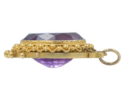 Lot 86 - A good Victorian gold Etruscan Revival amethyst set pendant.