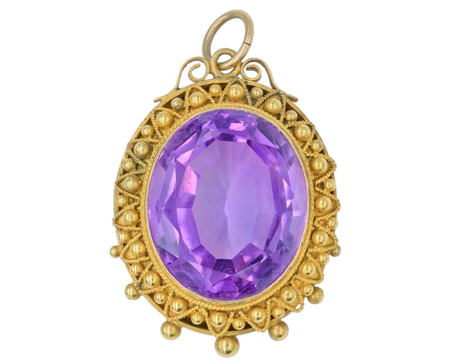 Lot 86 - A good Victorian gold Etruscan Revival amethyst set pendant.
