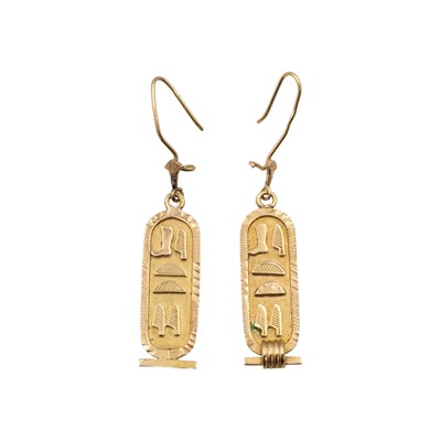 Lot 111 - A pair of Egyptian high purity gold hieroglyphic amulet pendant earrings.