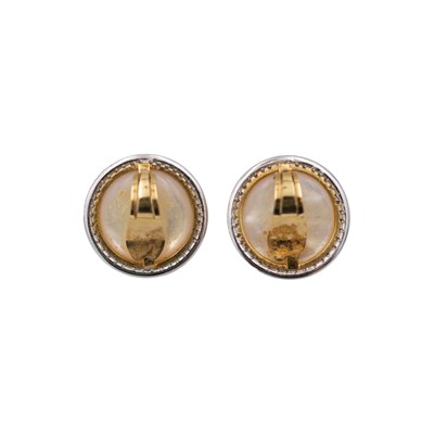 Lot 121 - A good pair of large mabe pearl and diamond set 14k white and yellow gold clip earrings.