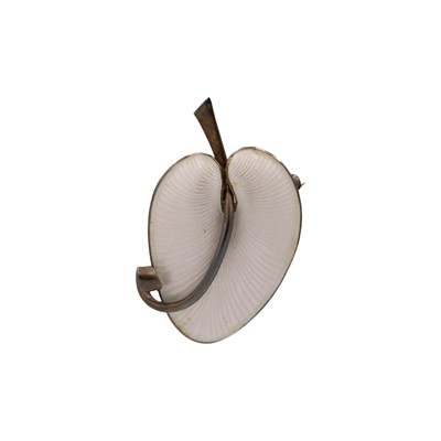 Lot 175 - VOLMER BAHNER - A Danish sterling silver and white guilloche enamel stylized leaf brooch.