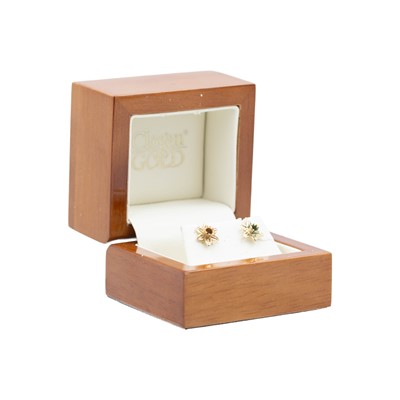 Lot 182 - CLOGAU - A pair of 9k gold daffodil design stud earrings within original box.