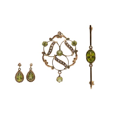 Lot 187 - A selection of gold peridot set jewels.
