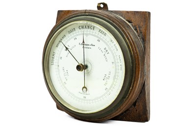 Lot 137 - An oak aneroid Barometer.