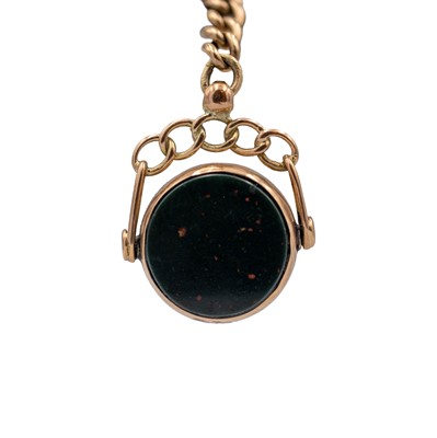Lot 198 - A 9k graduated curb-link chain, applied with a 9k carnelian and bloodstone swivel fob.