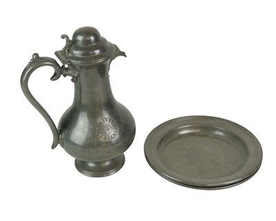 Lot 75 - A 19th century pewter communion set.