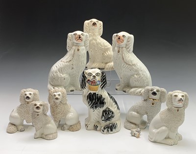 Lot 878 - A Victorian Staffordshire pottery spaniel...