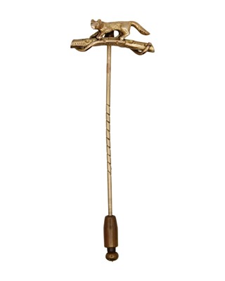 Lot 207 - A Victorian yellow gold stock pin, the head cast as a fox on a log.