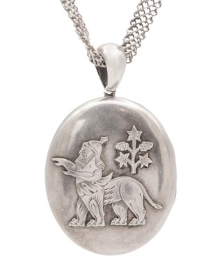 Lot 210 - A Victorian silver Assyrian Revival locket depicting a Lamassu, on a long woven link chain.