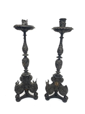 Lot 2006 - A pair of early 18th century style ebonised...