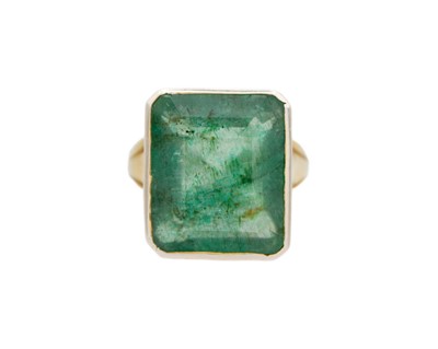 Lot 311 - A silver-gilt cocktail ring set with a large emerald.