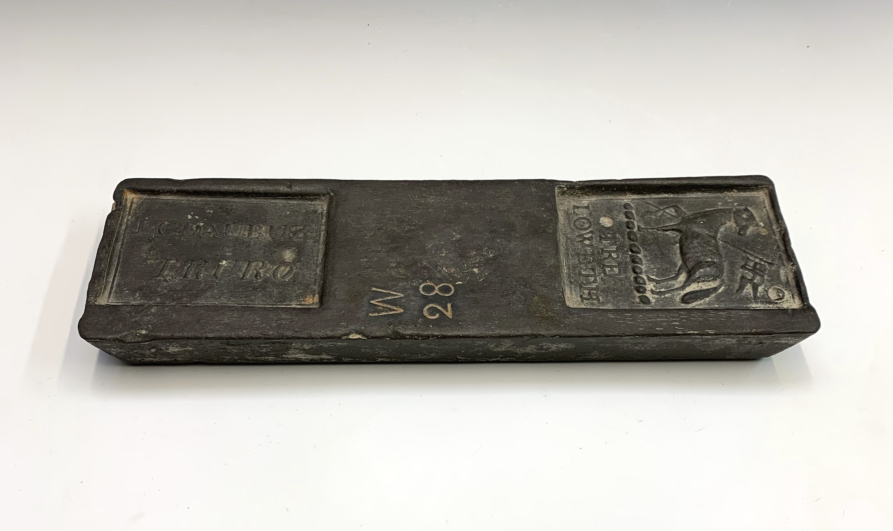 Lot 322 A 19th century Cornish tin 28lb ingot,