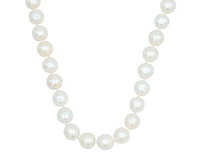Lot 281 - A contemporary large cultured pearl necklace, strung to a silver diamond-set lobster claw clasp.