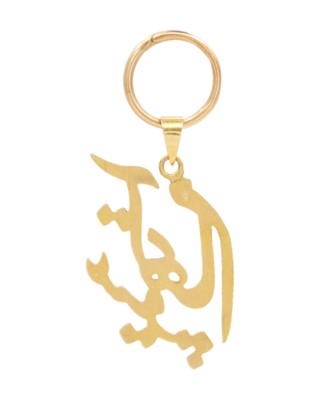Lot 291 - An 18k (tested) Middle Eastern calligraphy pendant on gold split ring.