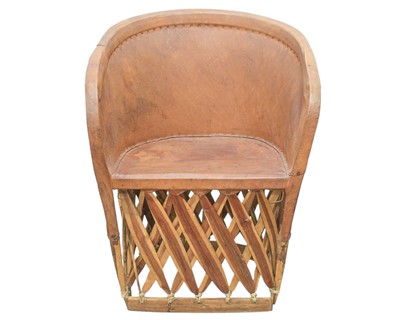 Lot 601 - A handcrafted Mexican Equipale chair.