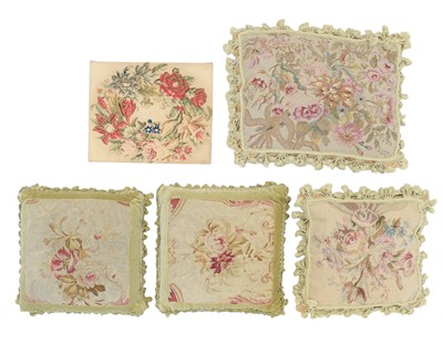 Lot 358 - A pair of floral tapestry cushions, both with green velvet borders, backs and passementerie.