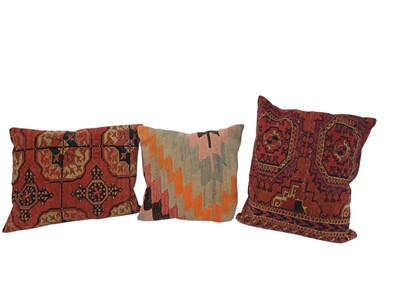 Lot 330 - Two Tekke rug covered cushions.
